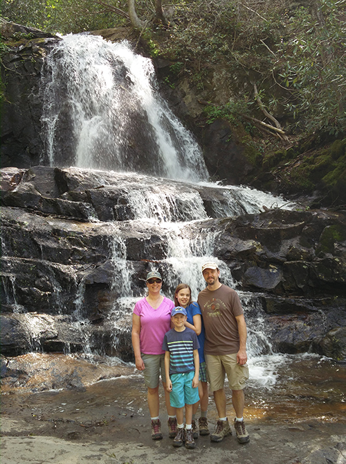 Jillian and family at a waterfall